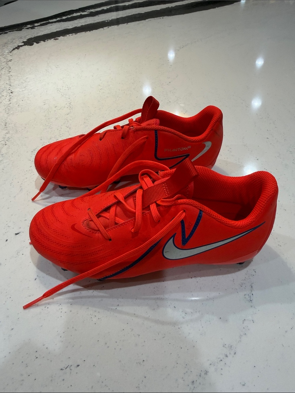 Nike Kids' Red Soccer Cleats with Silver Swoosh
